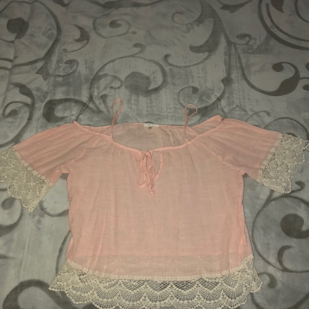 A light pink over the shoulder top